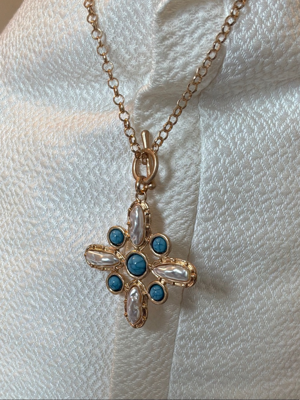 Gold Cross Pendant Necklace with Blue and Pearl Stones